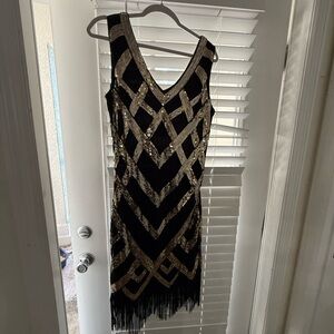 Elegant Black Dress with Gold Sequin Design